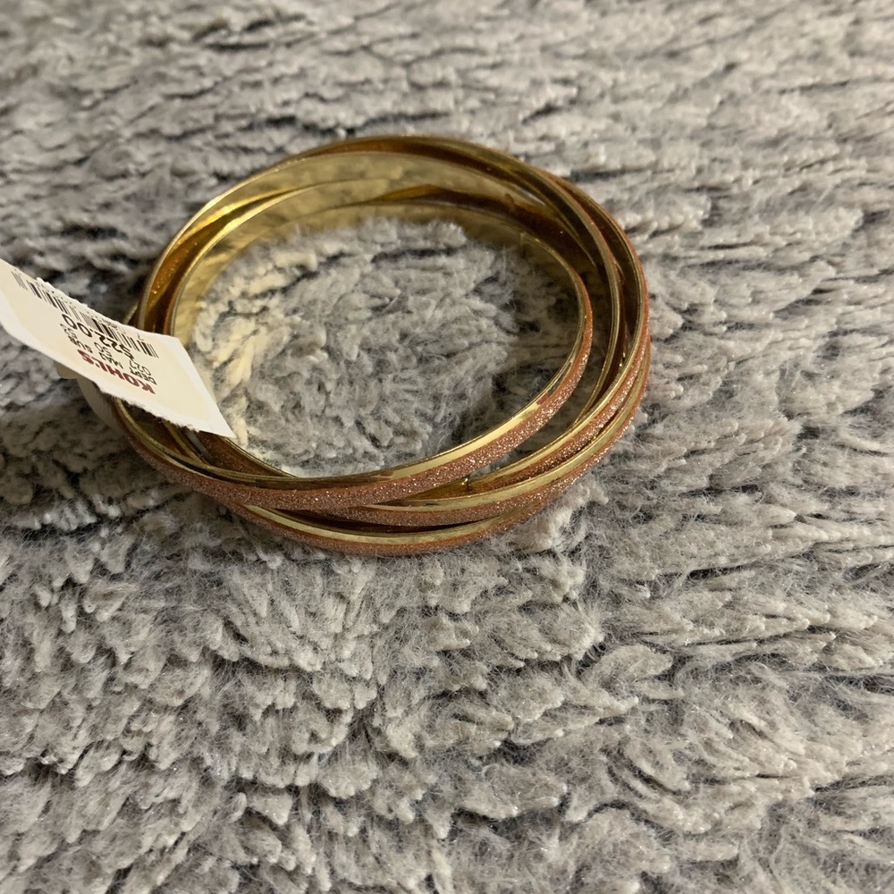 Set of gold and rose gold bracelets